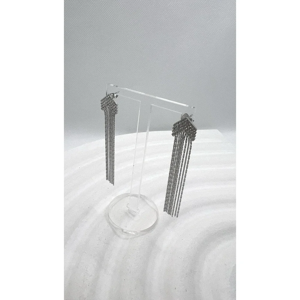 Long‎ earrings with chain fringes and rhinestones.